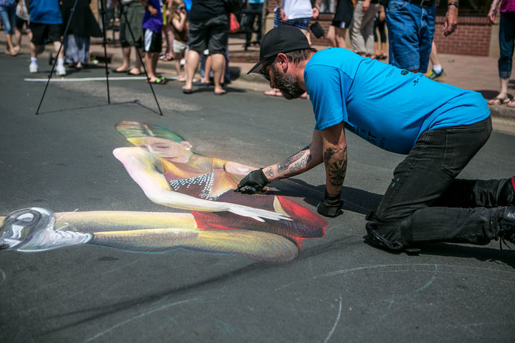 Tony Cublioquido from Italy working on his 3D piece at the inagural chalkfest.