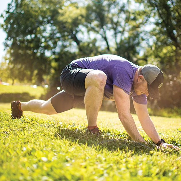 Charles Haupert stretches before a run.