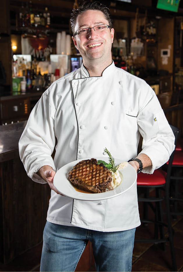 Chef Jason Littlefield serving up the prime rib dinner at Maple Tavern