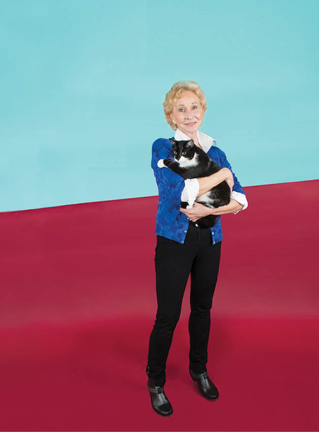 (Animal Wellness Center's Dr. Carolyn Apker makes every feline feel healthy and pampered.)