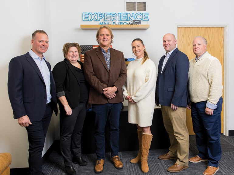 From left to right: Chair AJ Stevens, Malone’s Bar and Grill; 2023 vice chair Lisa Alberts, Rush Creek Golf Club; executive director Greg Anzelc; general manager Anne Anderson; treasurer Justin Walsh, Omni Brewing; 2024 vice chair Craig Fokken, Henningsen & Snoxell Ltd.