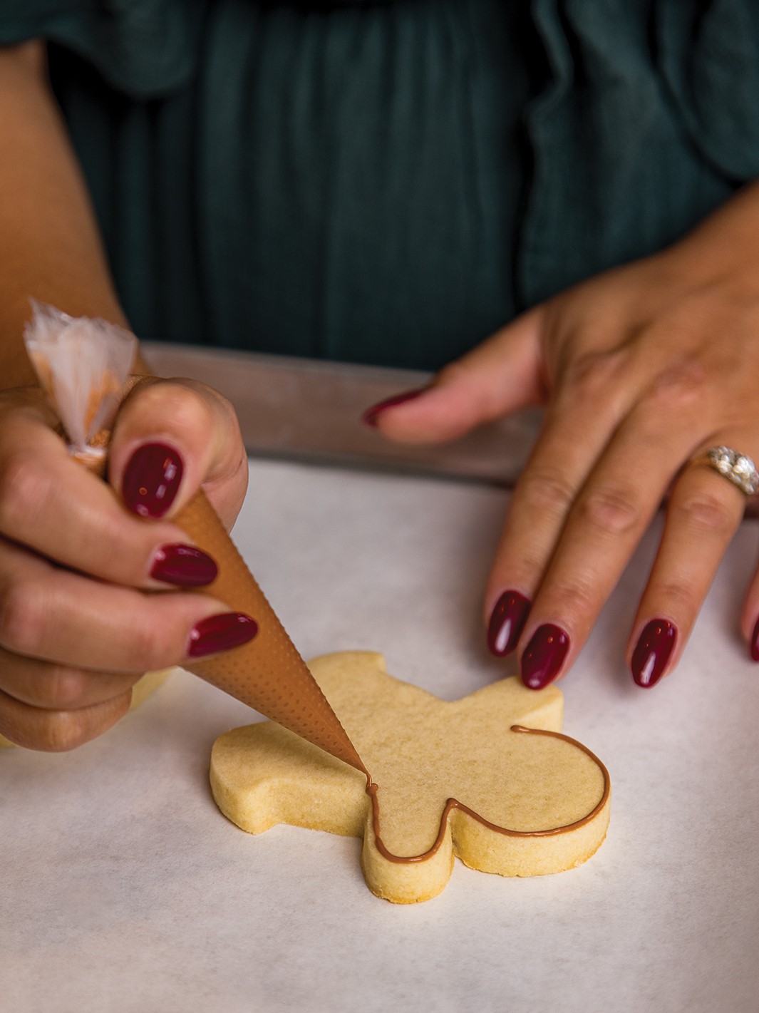 Christina Stewart Decorating a Cookie