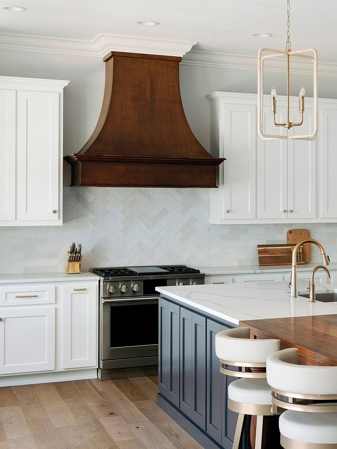 Take your kitchen to the next level with a large statement range hood.