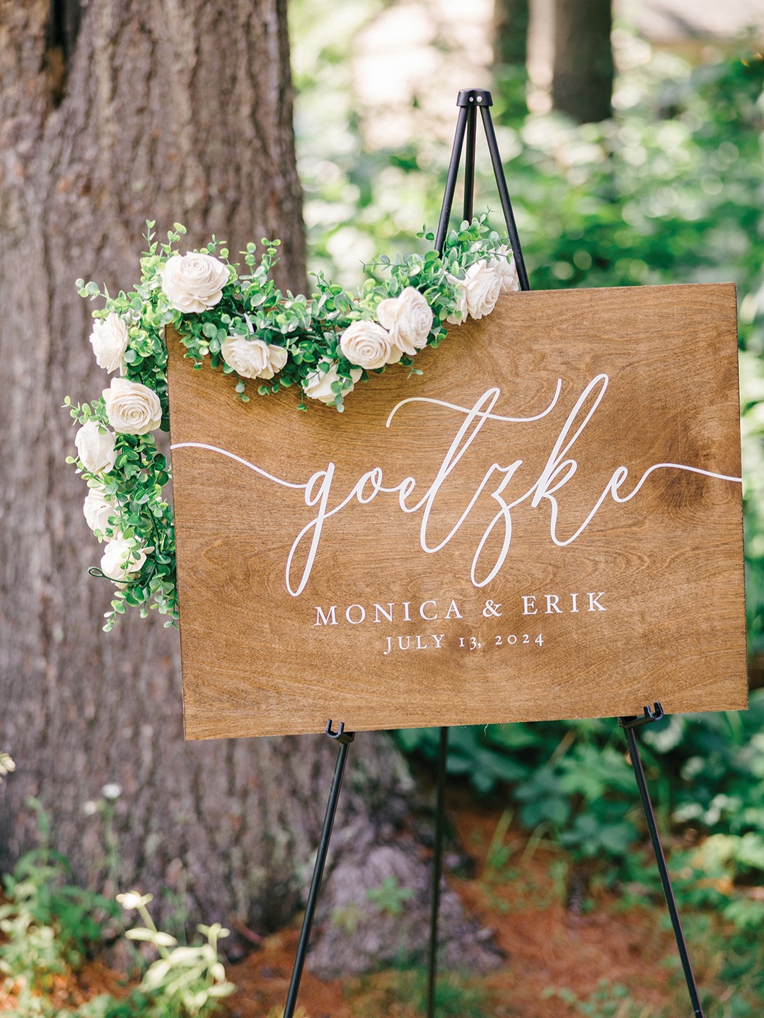 handwritten wooden welcome sign