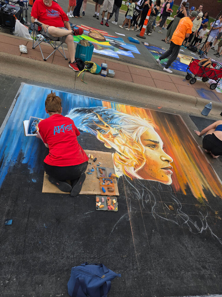 Chalkfest Maple Grove Artist Working on Portrait of Daenerys Targaryen from Game of Thrones Mural