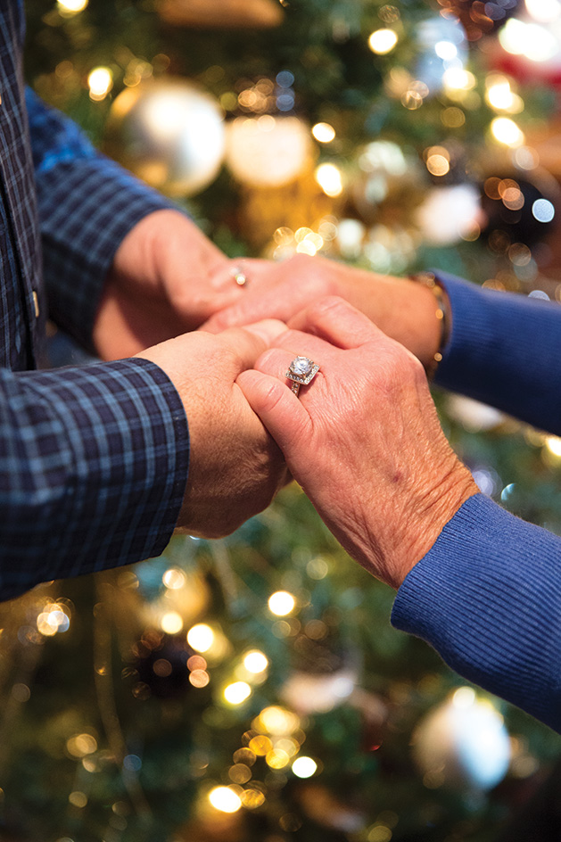 Lori and Bill Beach holding hands