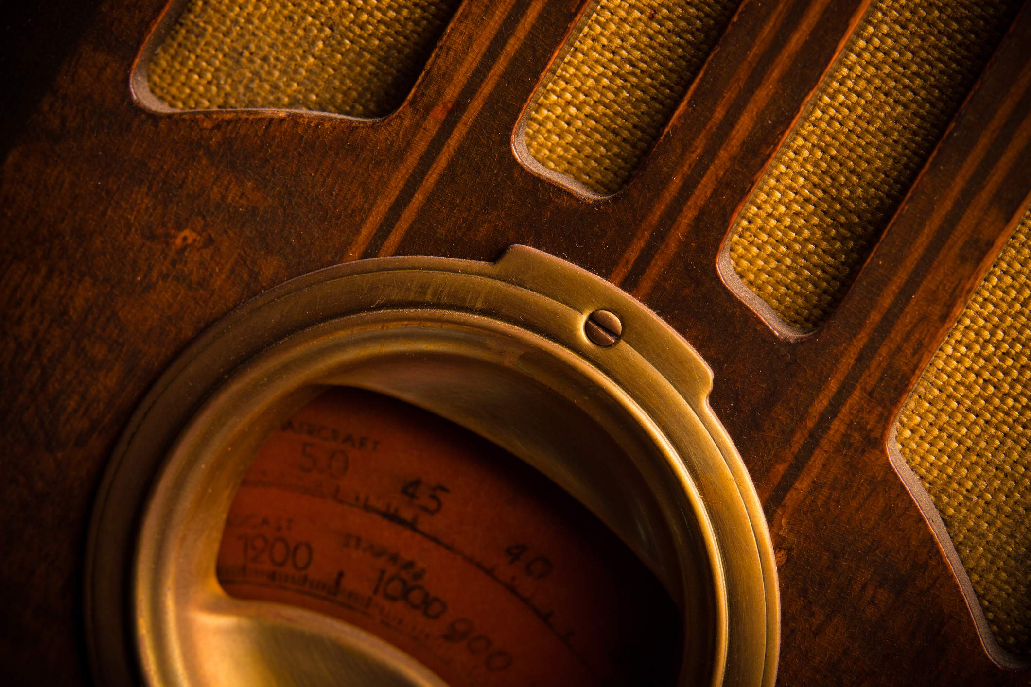 Close-up detail of a vintage old-fashioned 1930's radio made of wood