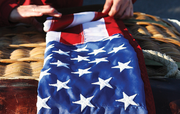 Old glory: Our nation’s flag affords respect, whether flying high or retiring from service.
