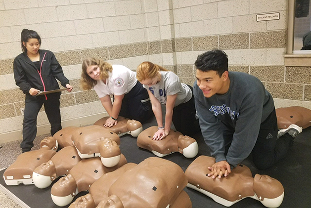 Osseo High School Students Certify the Neighborhood