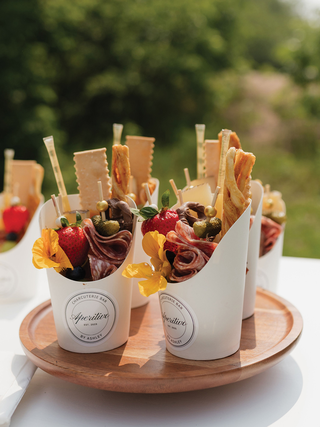 Alongside the charcuterie cart, Aperitivo offers customizable cups for on-the-go snacking.