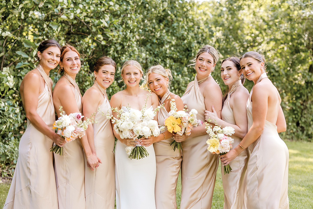 The champagne hue of the bridesmaids’ dresses complemented Brooke Vogt’s soft color palette of cream, light pink and soft yellow.
