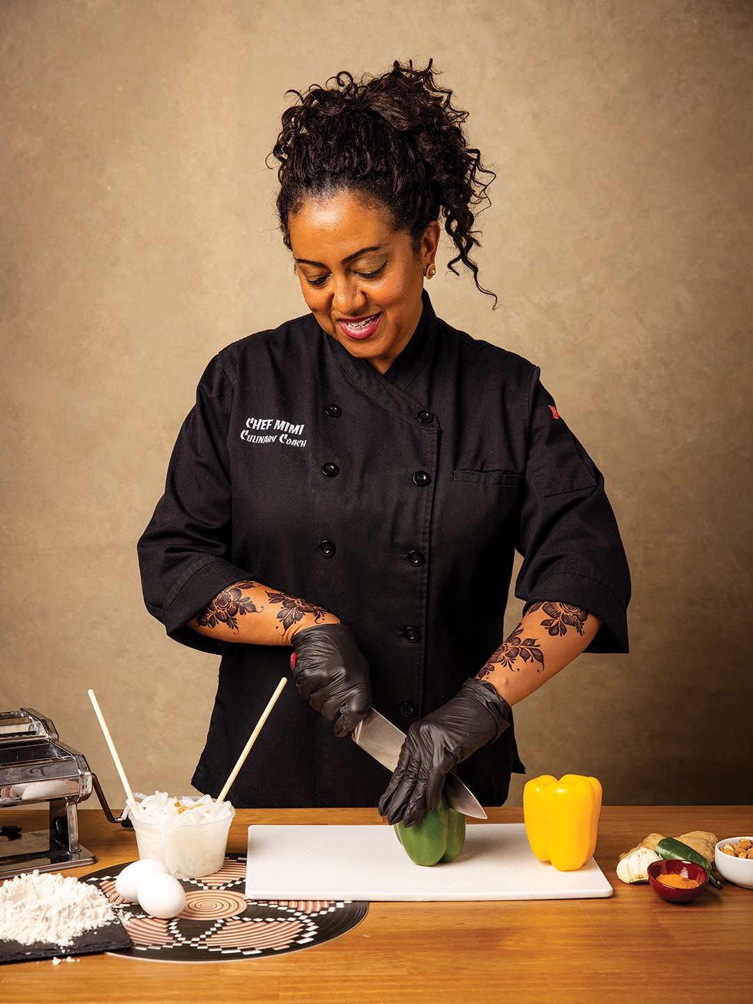 Mimi Selam Asfaha, known as Chef Mimi to her students, offers cooking classes throughout the Metro, including through Osseo Area Schools Community Education. Hair by Kissy Braids; jewelry and décor by Habeshawi Market; and nails by Turbo Nails in Cottage Grove.